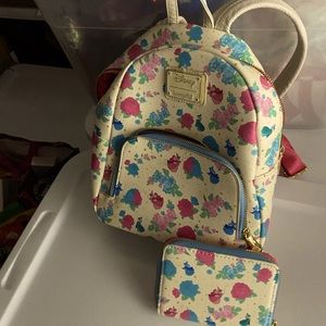 Loungefly Sleeping Beauty Fairy Godmothers back pack and wallet.